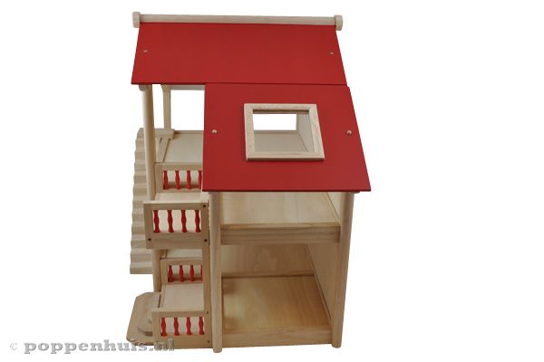 Een mooi rood dak en balkon.